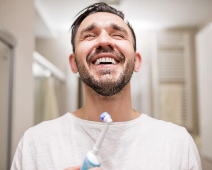 como usar cepillo de dientes ele´ctrico